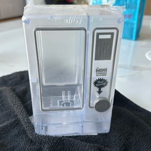 Clear plastic desktop candy dispenser